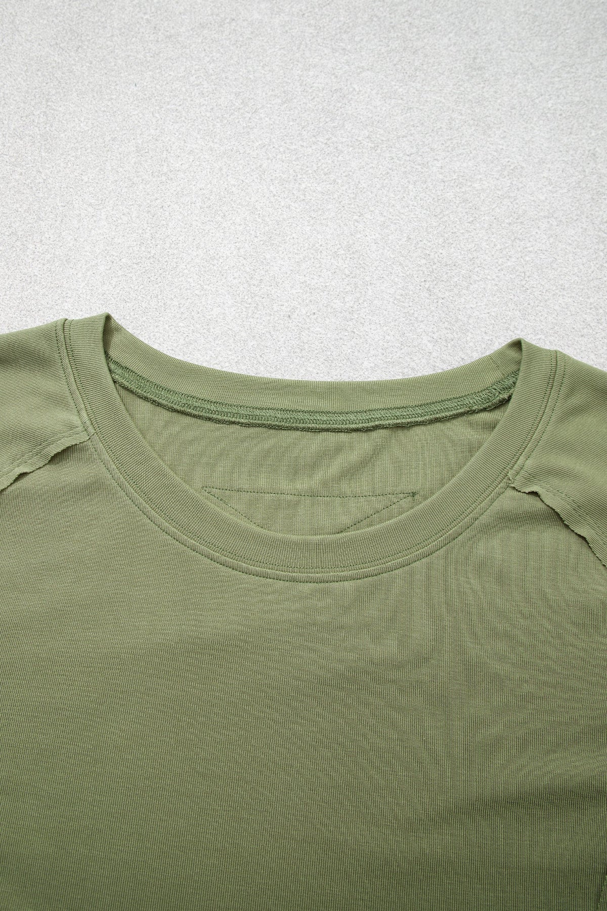 Solid Reverse Seam Paneling Long Sleeve Top