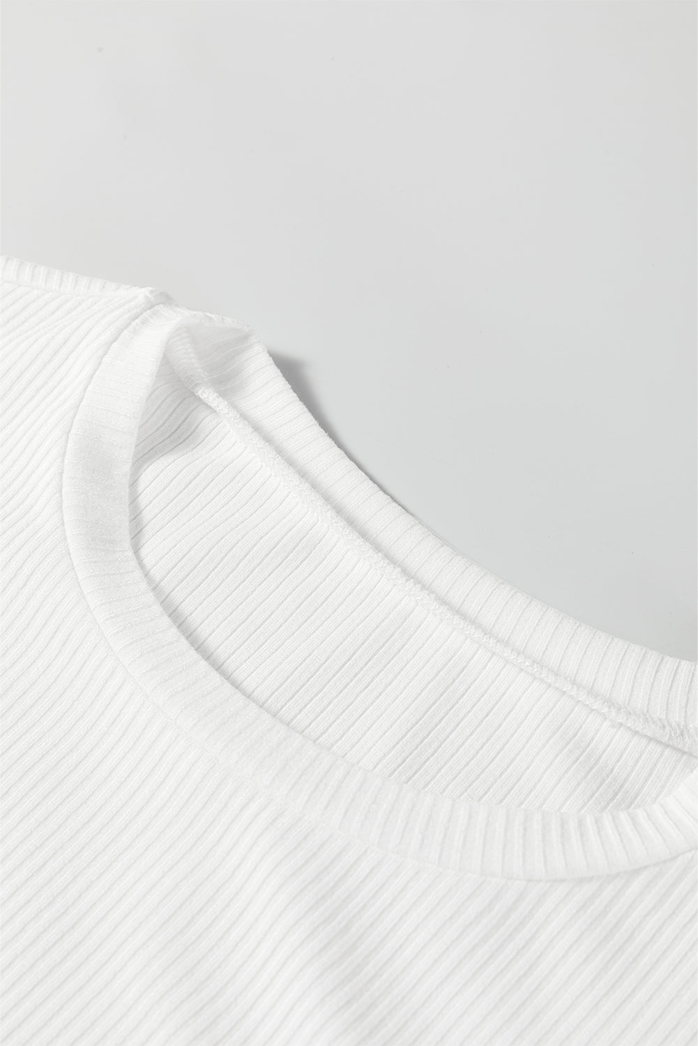 Solid Ribbed Round Neck Long Sleeve Bodysuit