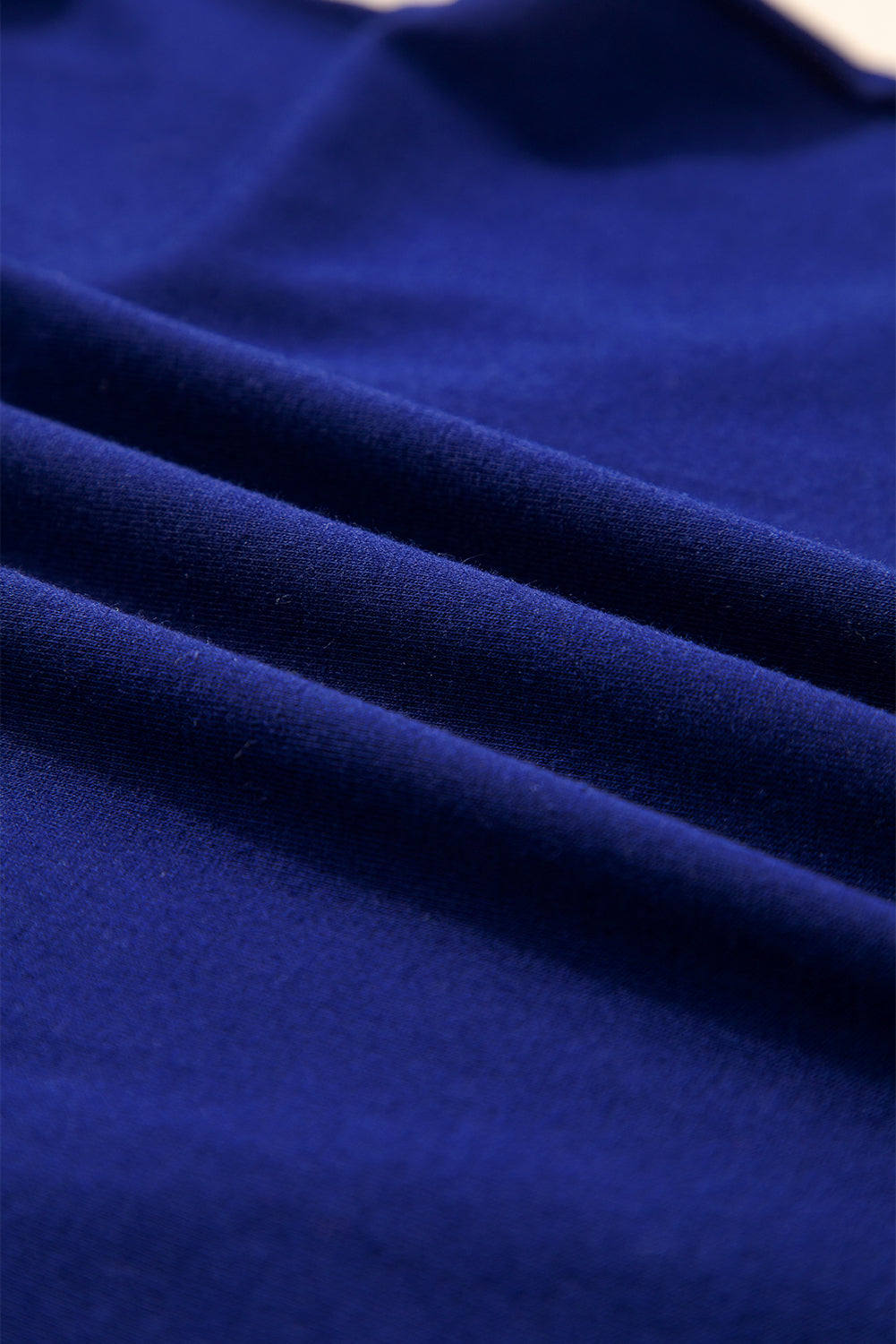 Solid Asymmetric Seam Long Sleeve Top