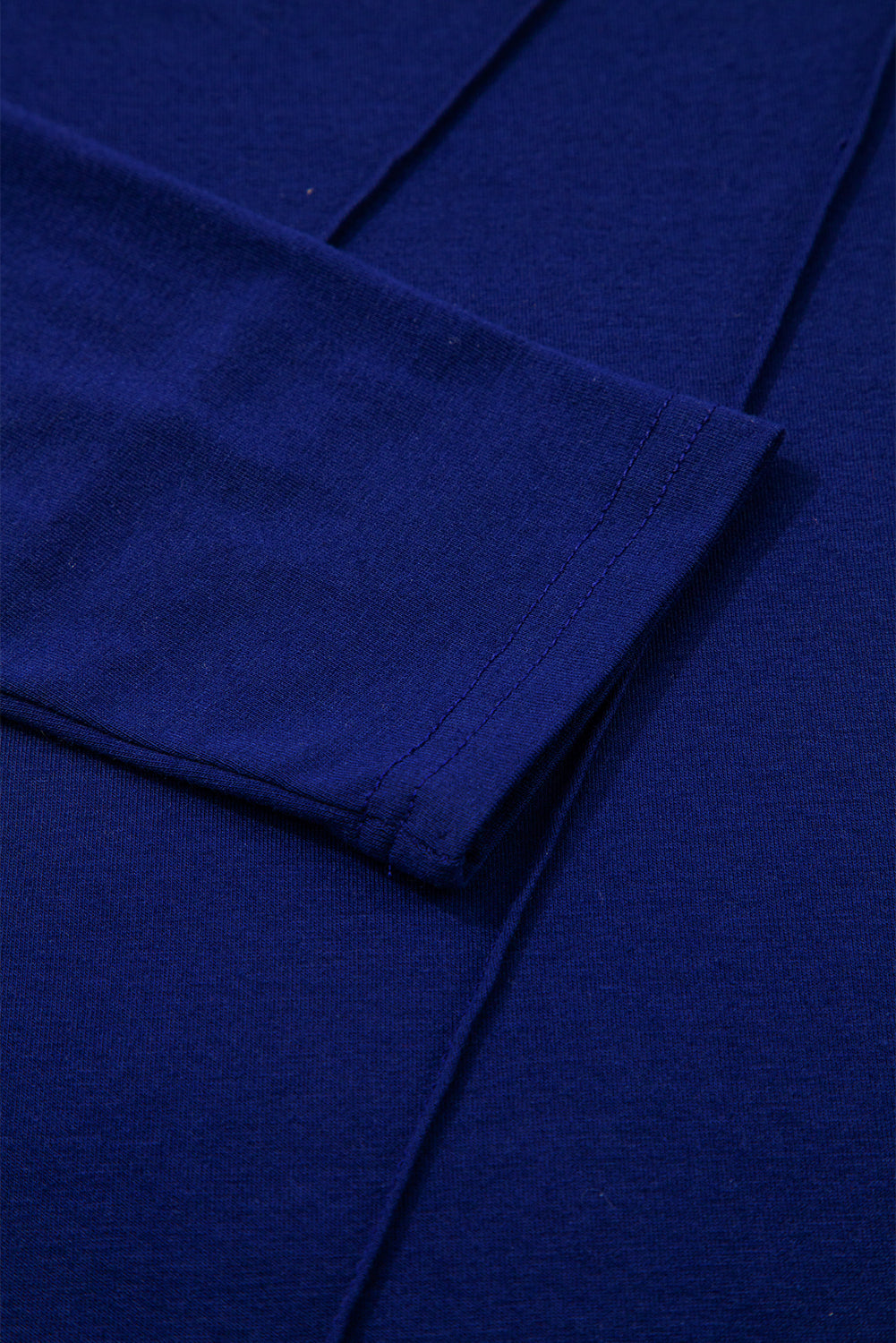 Solid Asymmetric Seam Long Sleeve Top